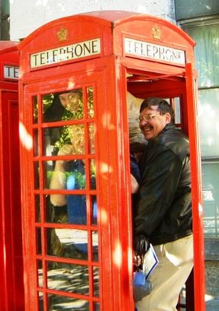 People in the Harry Potter Tour Phone Box.