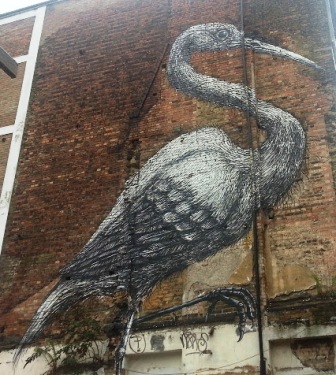 A large bird on a wall on the Spitalfields Safari.