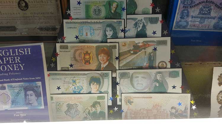 The Harry Potter money in the window of Colin Narbeth.