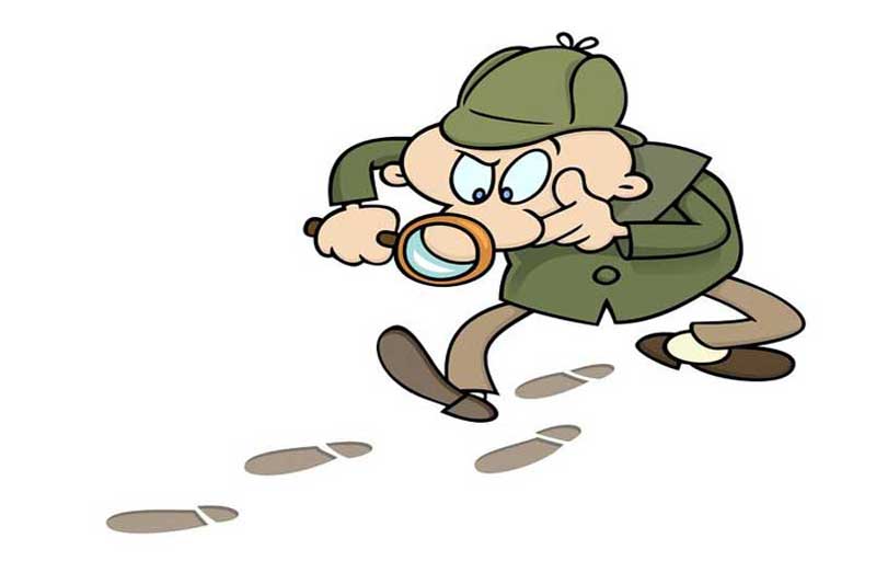 A cartoon holmes-like figure with a magnifying glass following footprints.