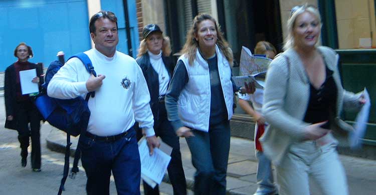 People walking on their Harry Potter tour of London.