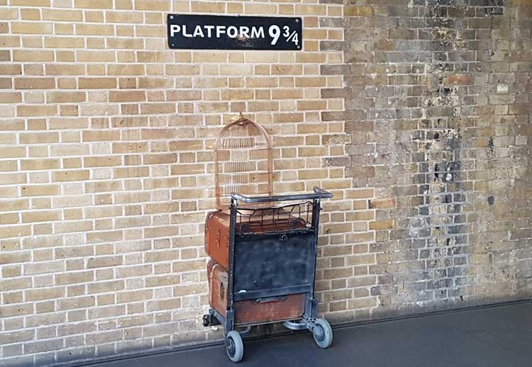 The trolley in the wall at Platform nine-and-three-quarters.